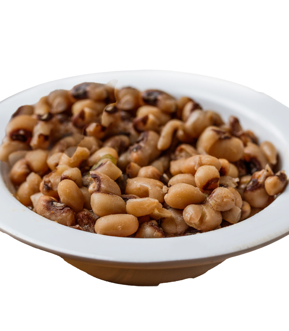 Enjoy a bowl of black-eyed peas, slow-cooked with spices and smoky flavors for a comforting and nutritious dish often enjoyed on New Year's Day for good luck.