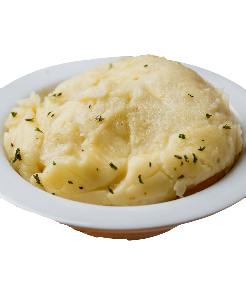 Indulge in our creamy mashed potatoes, the ultimate comfort food, whipped to perfection and ready to soak up all your favorite gravies.