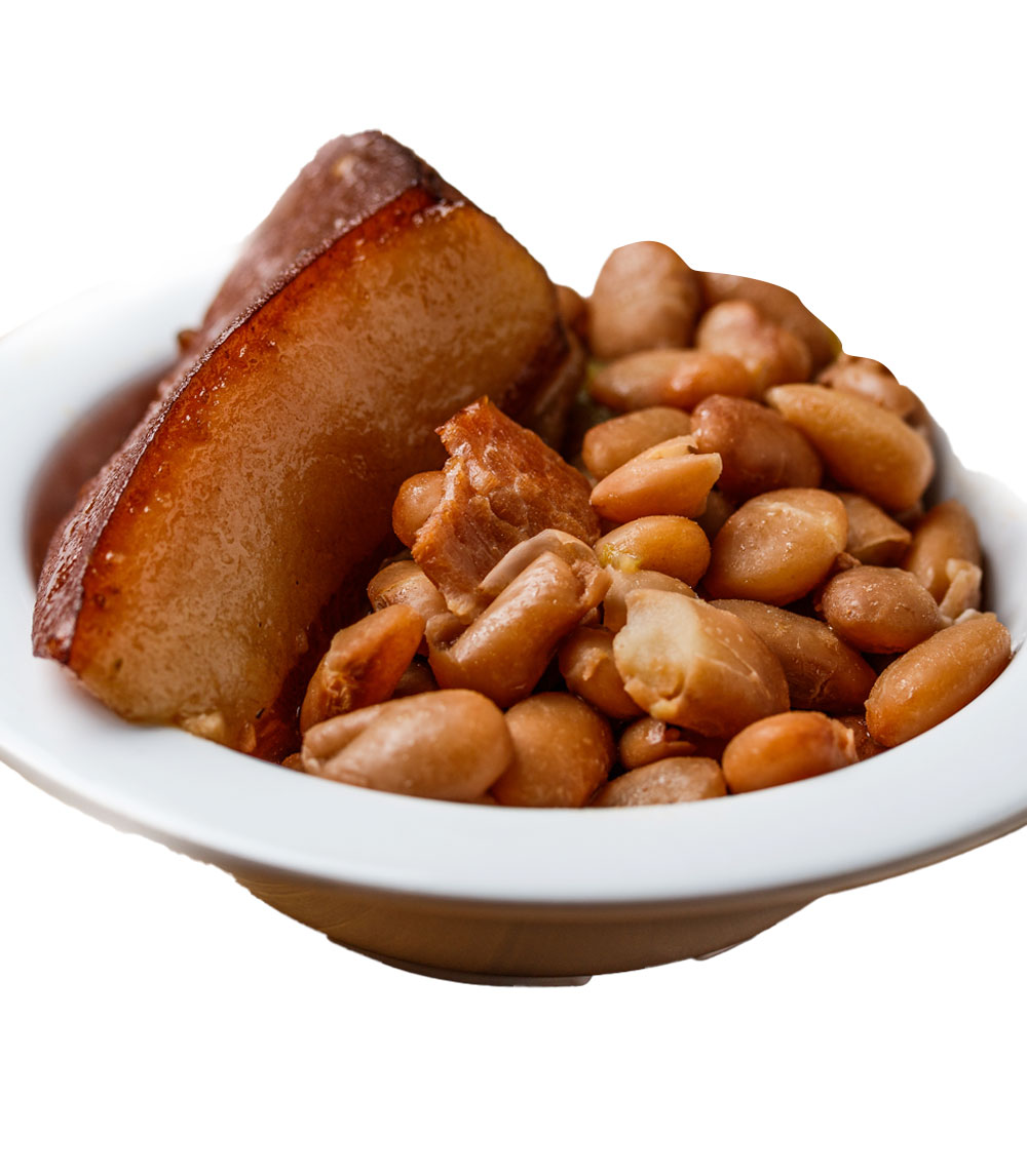 Savor our pinto beans, slow-cooked to perfection with savory spices and a touch of smoked meat for a hearty and flavorful side dish that embodies Southern comfort.