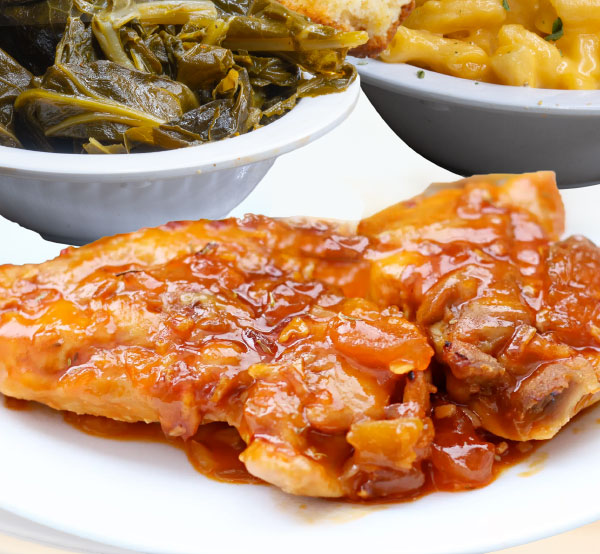 Savor our apricot chicken, a delightful dish featuring tender chicken baked in a sweet and tangy apricot glaze, offering a unique twist on a classic favorite.