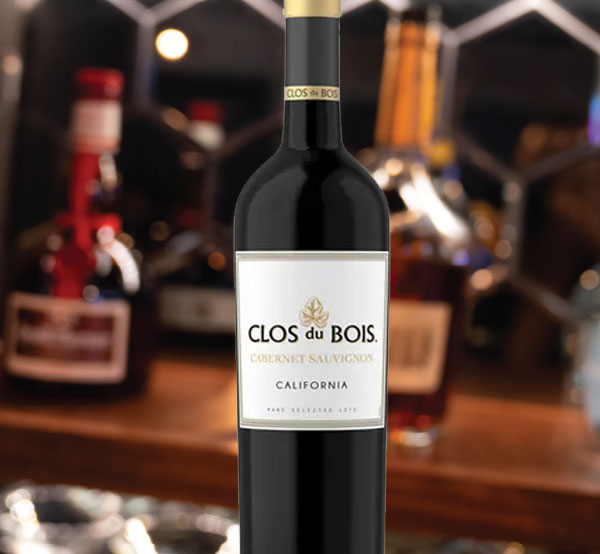 A bottle of Clos du Bois wine, showcasing its elegant label and rich color, perfect for pairing with hearty dishes.