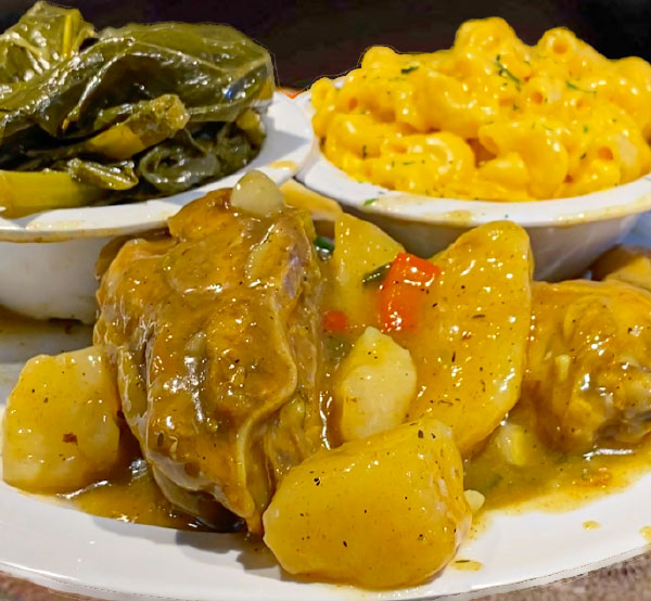 Savor our curry chicken, a flavorful dish featuring tender chicken pieces simmered in a rich, aromatic curry sauce with a blend of spices that brings a taste of the Caribbean to your plate.