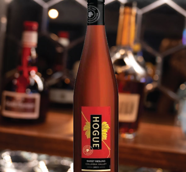 A bottle of Hogue wine, featuring a vibrant label and a selection of flavors that complement a variety of dishes.
