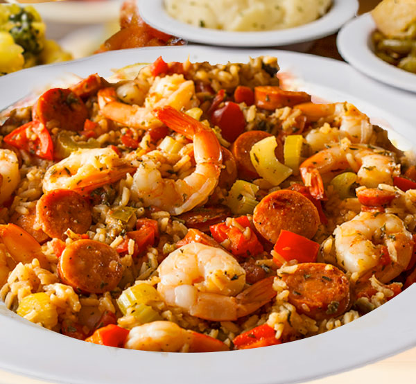 Savor our jambalaya, a vibrant one-pot dish packed with flavorful rice, tender chicken, smoky sausage, and shrimp, all seasoned with authentic Cajun spices.