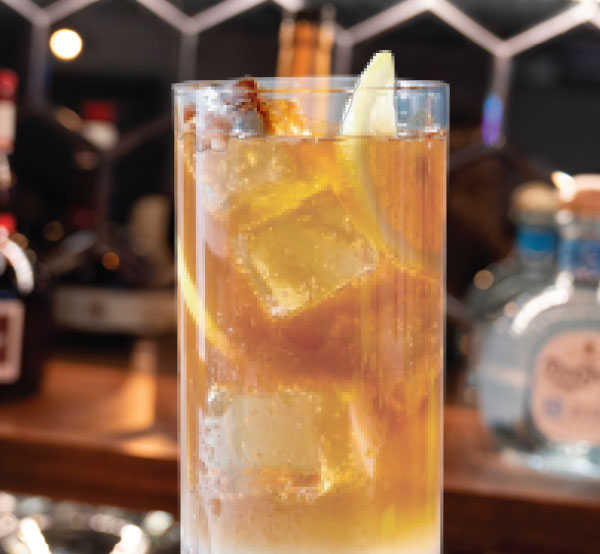 A potent Long Island Tea made with vodka, rum, gin, tequila, triple sec, and orange-flavored liqueur, served over ice.
