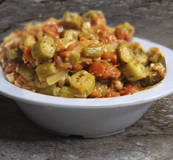 Savor the vibrant flavors of okra and tomatoes, a classic Southern dish featuring tender okra and juicy tomatoes simmered together with spices.