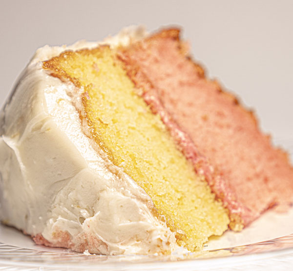 A delightful combination of lemon and strawberry flavors layered in a moist cake, perfect for indecisive dessert lovers!