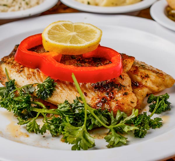 Enjoy our baked tilapia, seasoned to perfection and baked until flaky, offering a light and healthy option that’s full of flavor.