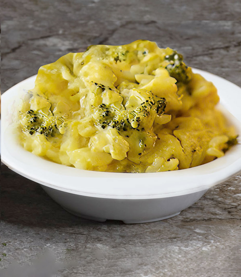 Enjoy a hearty broccoli rice cheese casserole, featuring tender broccoli florets and fluffy rice, all smothered in a creamy cheese sauce and baked to perfection.
