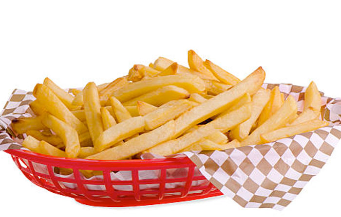A generous basket of golden, crispy fries, perfectly seasoned and ready to be enjoyed as a delicious side or snack.