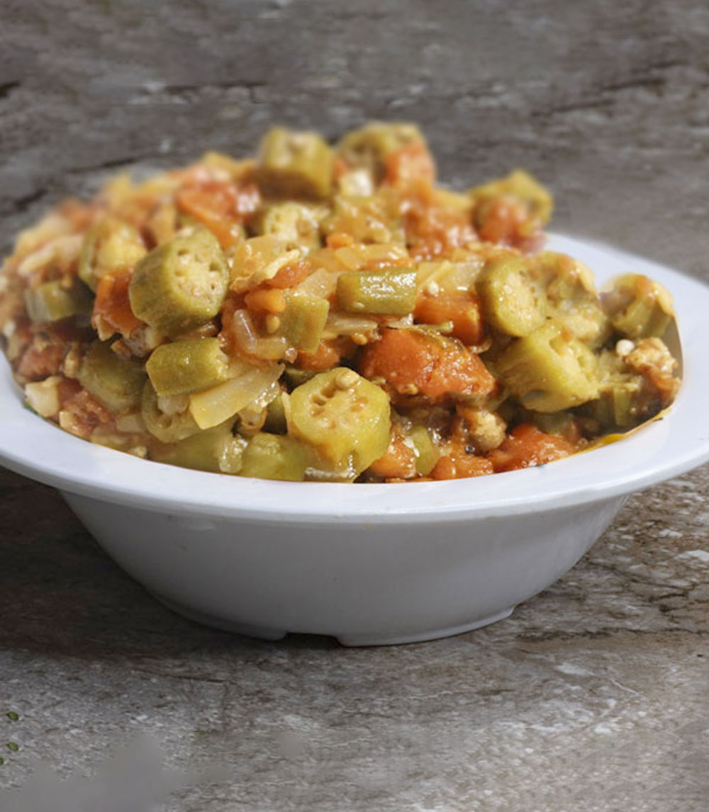 Savor the vibrant flavors of okra and tomatoes, a classic Southern dish featuring tender okra and juicy tomatoes simmered together with spices.