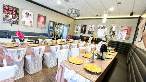 Elegant private dining room set for an event, featuring comfortable seating arrangements for up to 45 guests